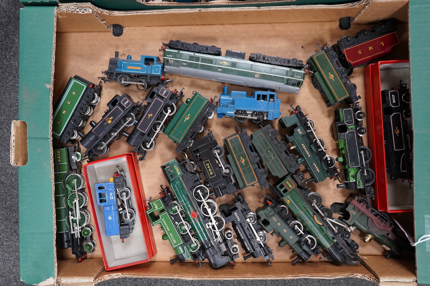 A collection of 00 gauge railway by Hornby, Tri-ang, etc. including; sixteen locomotives (a.f.), many for restoration, together with eighteen bogie coaches including; InterCity, LMS, and BR(MR). Condition - poor to good.